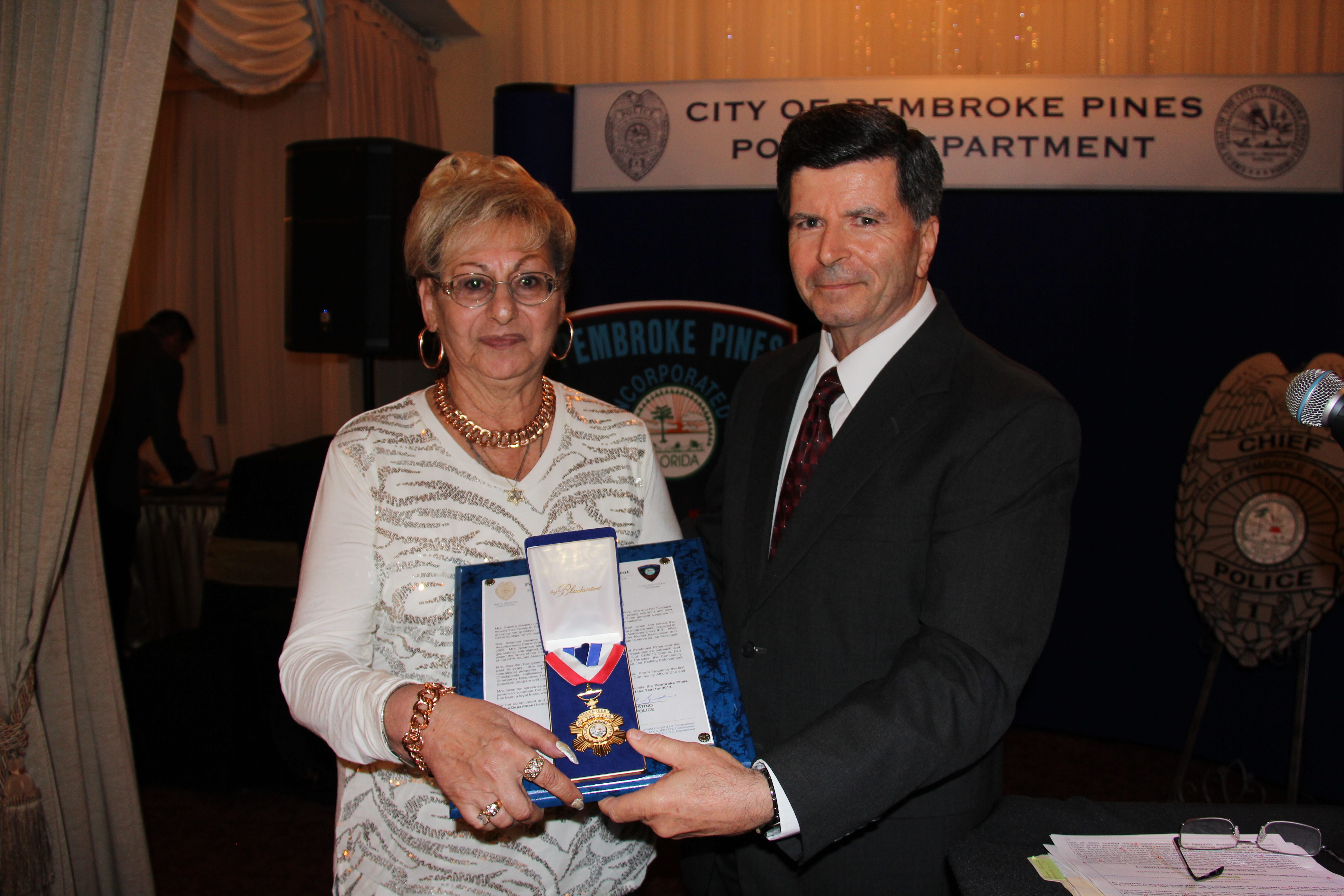 Volunteer Sandra Swanton and Chief Giustino